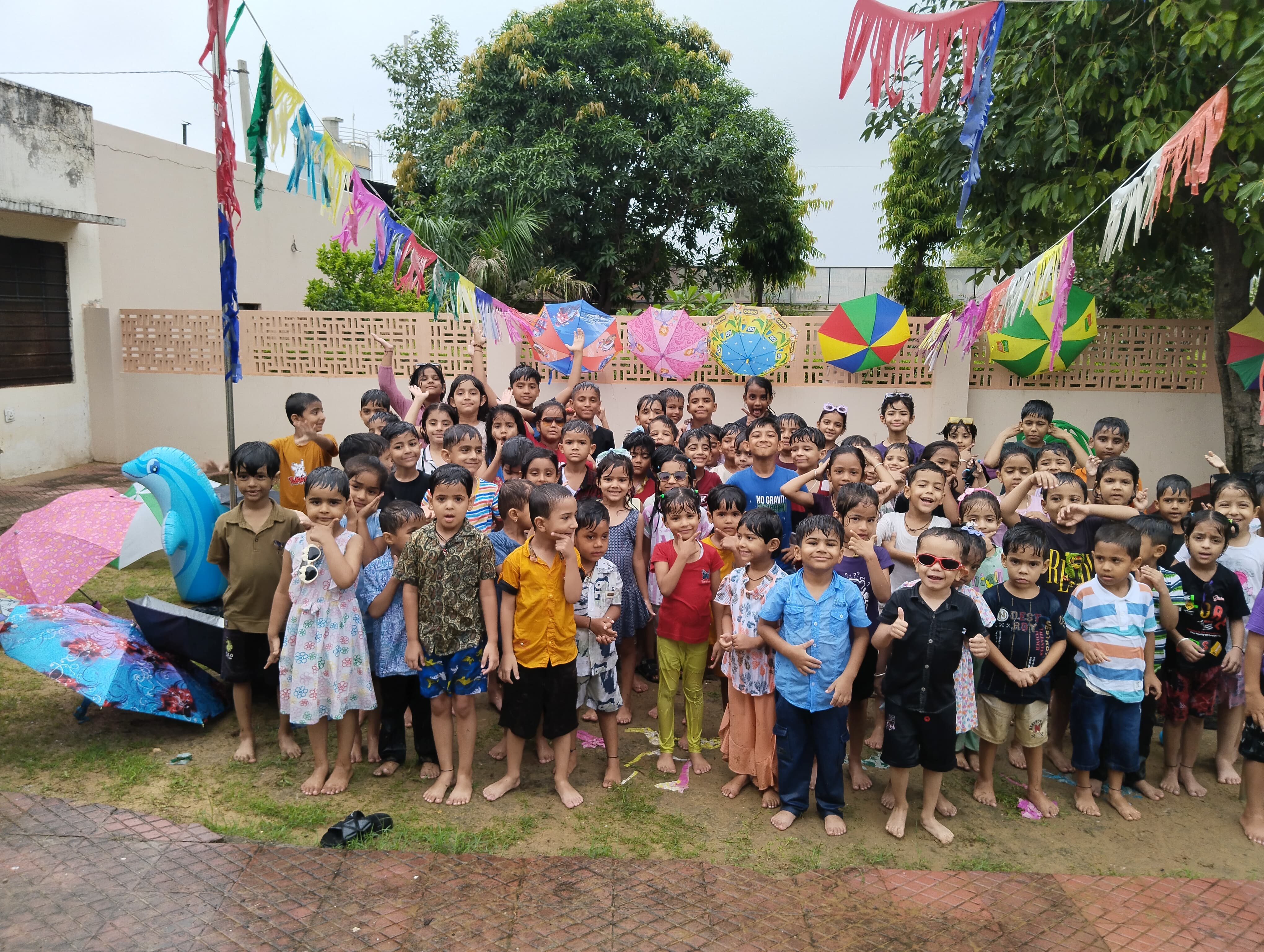 Tiny feet tapping in puddles with glee,
Rain dance at school, pure joy and spree!
